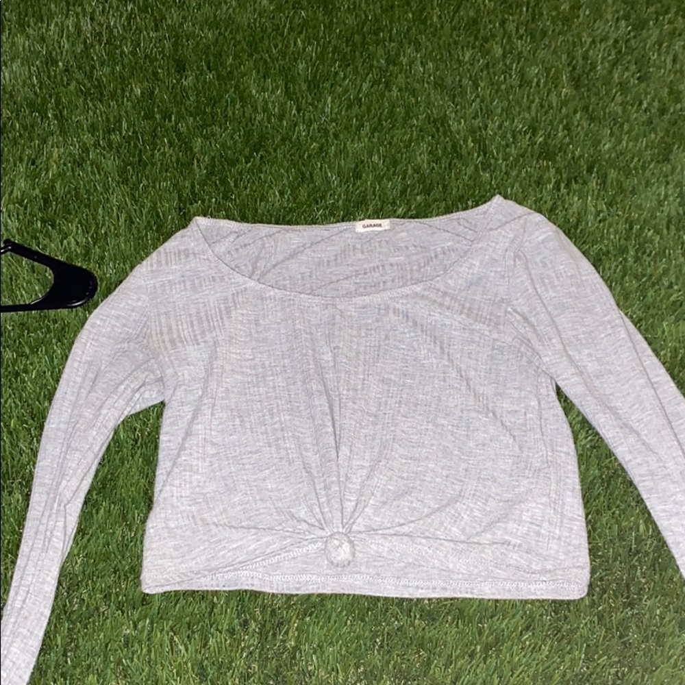 Cropped grey long sleeve.